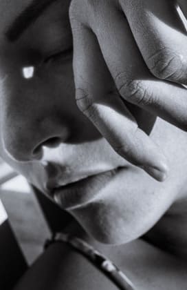 black and white photo of a womans face